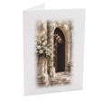 Cartonnage photo mariage vertical avec église fleurie et fleurs blanches