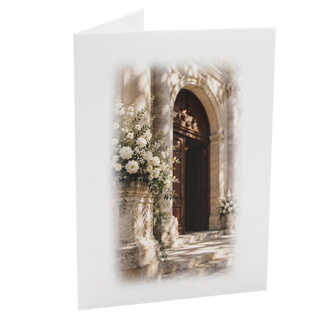 Cartonnage photo mariage vertical avec église fleurie et fleurs blanches